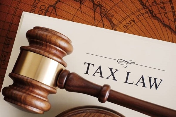 Company registration cost in Oman; Familiarity with tax laws